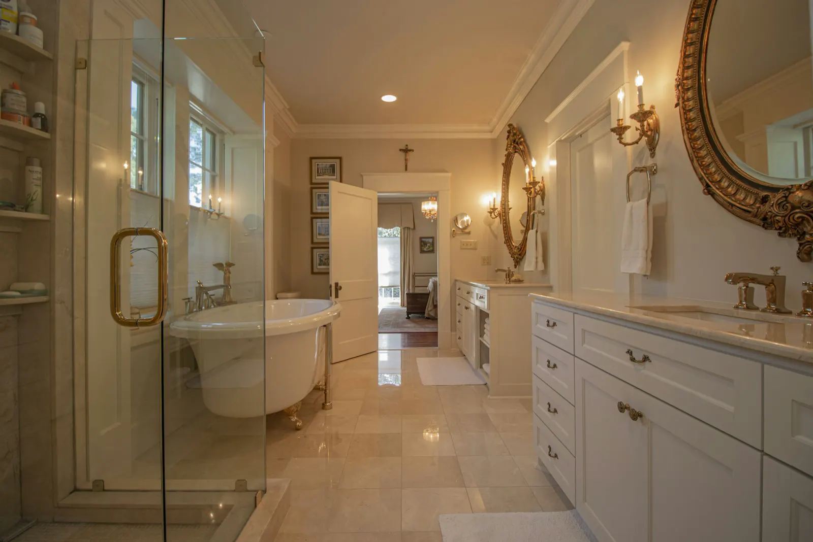 Primary suite with glass shower and soaking tub
