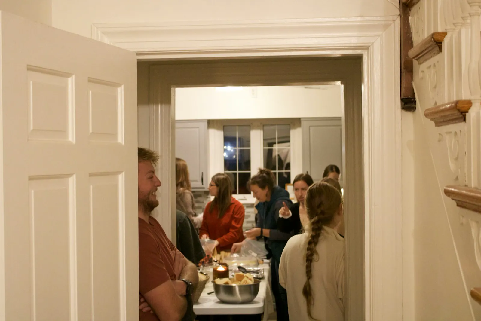 Family and friends gathered in the finished kitchen